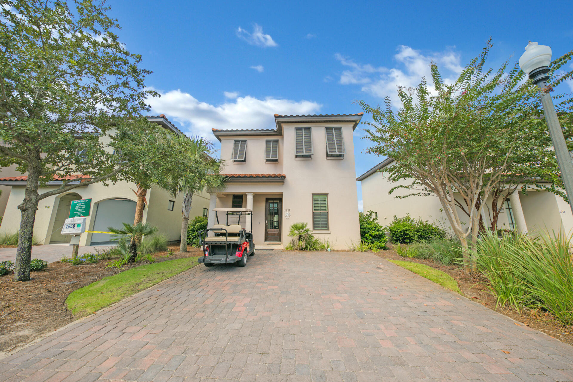 The gorgeous Villa Lago community is located behind the private gates of Sandestin situated between the Baytowne Golf Course and Venetian inspired canals which this home overlooks.  Boasting 3 bedrooms and 3 bathrooms spread out over two stories, this home is not to be missed! The first floor has travertine floors throughout, crown molding, and a kitchen which offers stainless steel appliances with granite countertops, mahogany cabinetry, and a large island/breakfast bar. The back patio also offers a serene sitting area overlooking the canal with a grill for all of your outdoor gatherings. One bedroom and full bath is located on the first floor with the bathroom showcasing granite countertops and a large walk-in shower. The second level hosts two bedrooms, a laundry room, and the media