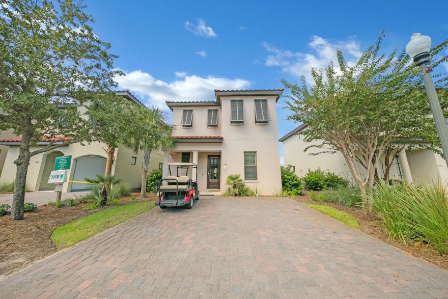 The gorgeous Villa Lago community is located behind the private gates of Sandestin situated between the Baytowne Golf Course and Venetian inspired canals which this home overlooks.  Boasting 3 bedrooms and 3 bathrooms spread out over two stories, this home is not to be missed! The first floor has travertine floors throughout, crown molding, and a kitchen which offers stainless steel appliances with granite countertops, mahogany cabinetry, and a large island/breakfast bar. The back patio also offers a serene sitting area overlooking the canal with a grill for all of your outdoor gatherings. One bedroom and full bath is located on the first floor with the bathroom showcasing granite countertops and a large walk-in shower. The second level hosts two bedrooms, a laundry room, and the media