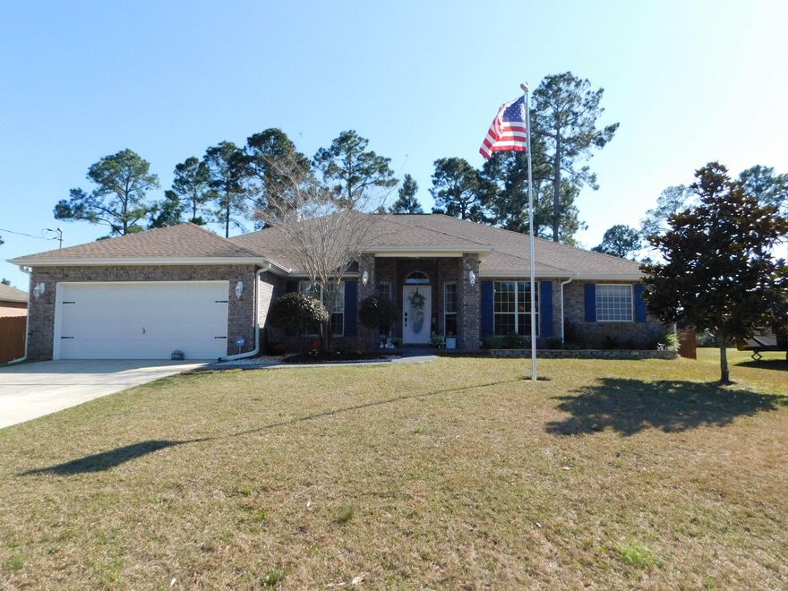 This Stunning 4 Bedroom, 3 Full Bath Home has a Formal Dining area, Formal Living space, Large Great Room with Built in Media area and Gorgeous Wood Burning Fireplace. Beautiful French Doors from Great Room, Kitchen, Master Bedroom and Pool Bath all access the Huge 43' Long Lanai. Dine outdoors on the lanai or serve formally in the Beautiful Dining Room. Interior of home is upgraded with wood look tile in the Eat-In Kitchen, which has a convenient Desk area, Center island, tons of Beautiful Maple Cabinets and Solid Surface (Quartz) countertops, Updated appliances and a Big Pantry! The Large Breakfast bar overlooks the Great Room. The Third Bath makes a perfect 'In-Law Suite' along with the 4th Bedroom.