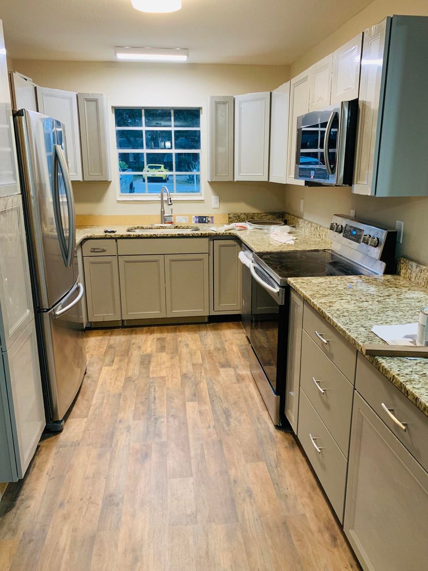 WILL BE COMING BACK 2/27 NO SHOWINGS TILL THEN. Home is calling! This stylish home features open living spaces with 3 bedrooms and 1.5 Hollywood style bathrooms all on a corner lot in Shalimar! The modern kitchen is your dream come true with brand new designer cabinets, granite countertops, and stainless steel appliances. The bathroom includes a fully tiled oversized shower, and dual vanities are located in separate spaces for privacy. The large back yard is fully fenced and ready for entertaining on these upcoming spring evenings, and the one car attached garage contains the laundry area with plenty of additional space available for your vehicle. Don't miss this opportunity to own your slice of paradise in Shalimar! Call today!