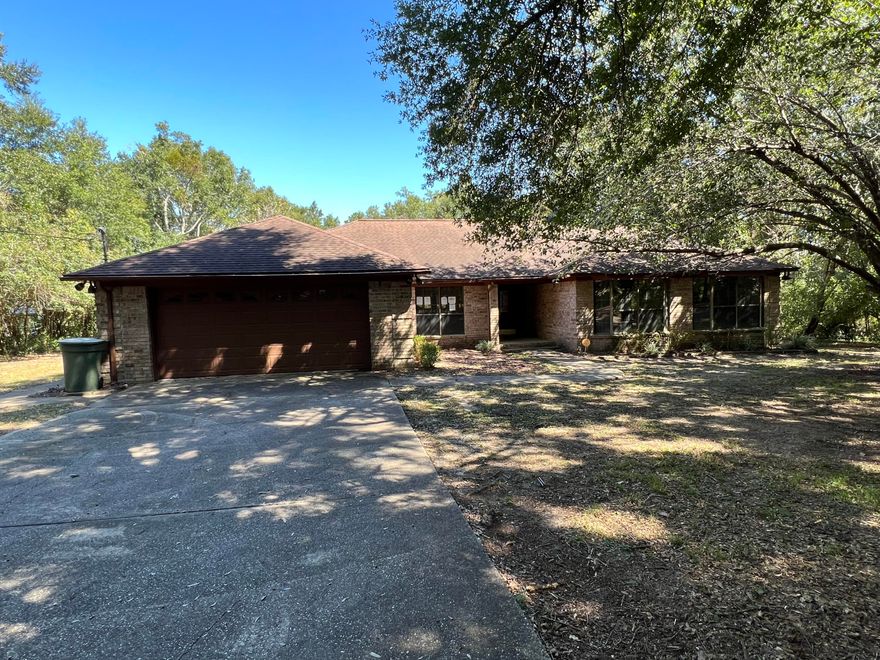 This custom built REO home is one to see! If you are looking for country living and still be close to town, this is it. Built in 1987, this all brick home has a 2 car garage, screen enclosed in-gound pool, rests on over an acre and comes with a detached pool house /entertainment room. Inside you will find split bedroom design with 4 bedrooms and 3 and 1/2 baths. Large brick fireplace in the living room; vaulted ceilings make this room feel massive! Just off the living room is an enclosed sunroom and 1/2 bath. This home has 2 master bedrooms and 2 master baths and the spare bedrooms are huge. A definite must see to appreciate! Call today!