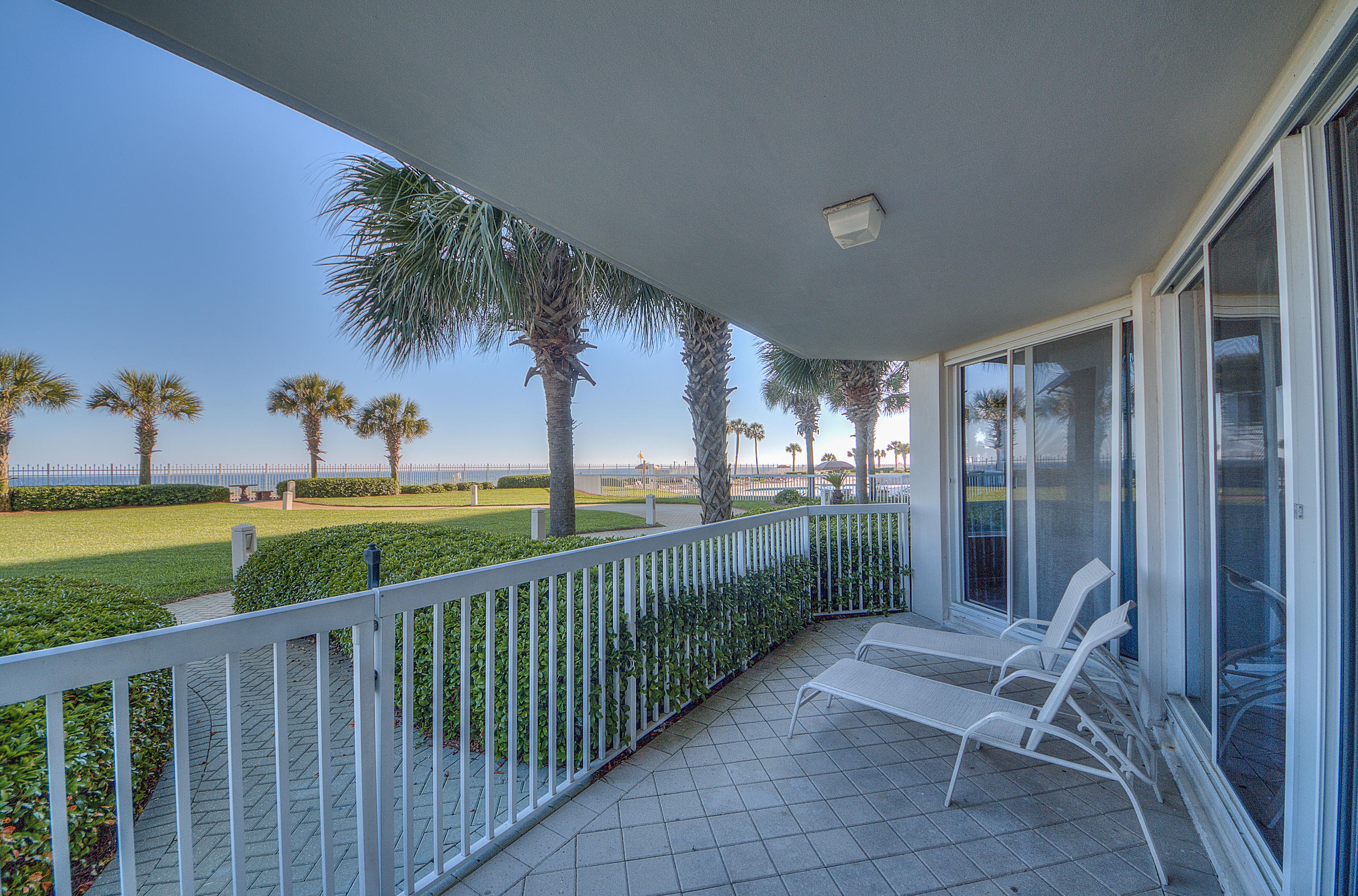 You must see this fabulous 1st Floor Penthouse that has been recently been renovated with new granite counter tops, new stainless appliances, new HVAC system and much more. This unit has the best of both worlds - 1st Floor convenience and amazing gulf views from all the rooms. Rare larger size unit that also comes with 2 Reserved Parking spaces right by the entrance to the unit. Rental projections $60,000. SEE NEW VIDEO under Photos.This unit feels like a Gulf Front House as you can walk right out your balcony doors and are seconds from being on the beach. You also get a resort style pool and beautifully landscaped fenced in yard just steps outside your unit, which is a great place for kids to play and adults to hang out. The unit also comes with a large storage space for beach gear