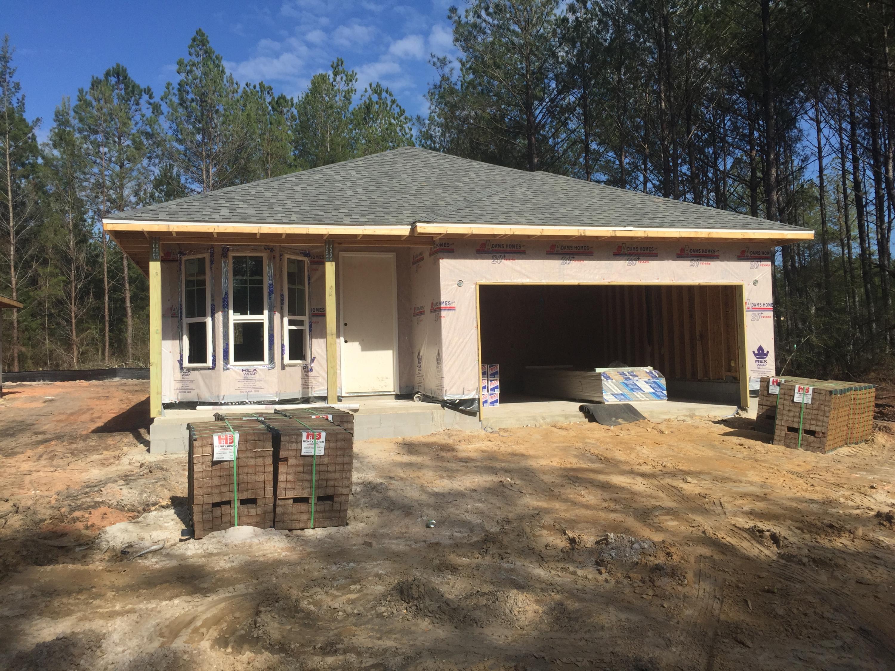 Now under construction in Lafayette Creek Landing, Freeport's newest water access subdivision. Adorable 3/2 Craftsman style home. Great location in Freeport, behind Publix and just 18 minutes to Grayton Beach! This home will have 9' ceilings, including tray ceiling in master bedroom, 8' entry doors, covered back porch, granite tops. Community pool and fitness room for owners to enjoy will be completed in subdivision Phase II which is now underway. Only $600/year association fee!