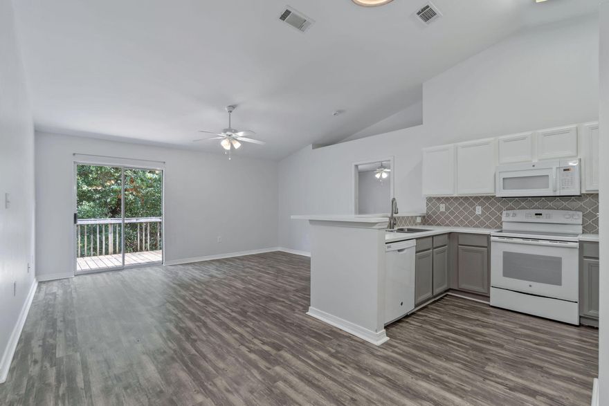 Welcome to the charming community of Ridge Crest located in South Crestview - a contemporary neighborhood situated just minutes away from downtown. This residence is located in the heart of convenience, providing easy access to all the amenities and attractions of the city. With 4 bedrooms, 2 bathrooms, and a thoughtfully designed split bedroom floor plan, this residence offers the perfect blend of space and functionality for today's Buyer. As you step inside, you'll be greeted by a bright and spacious living area adorned with a cathedral ceiling, clean lines and an abundance of natural light that flows through large windows.