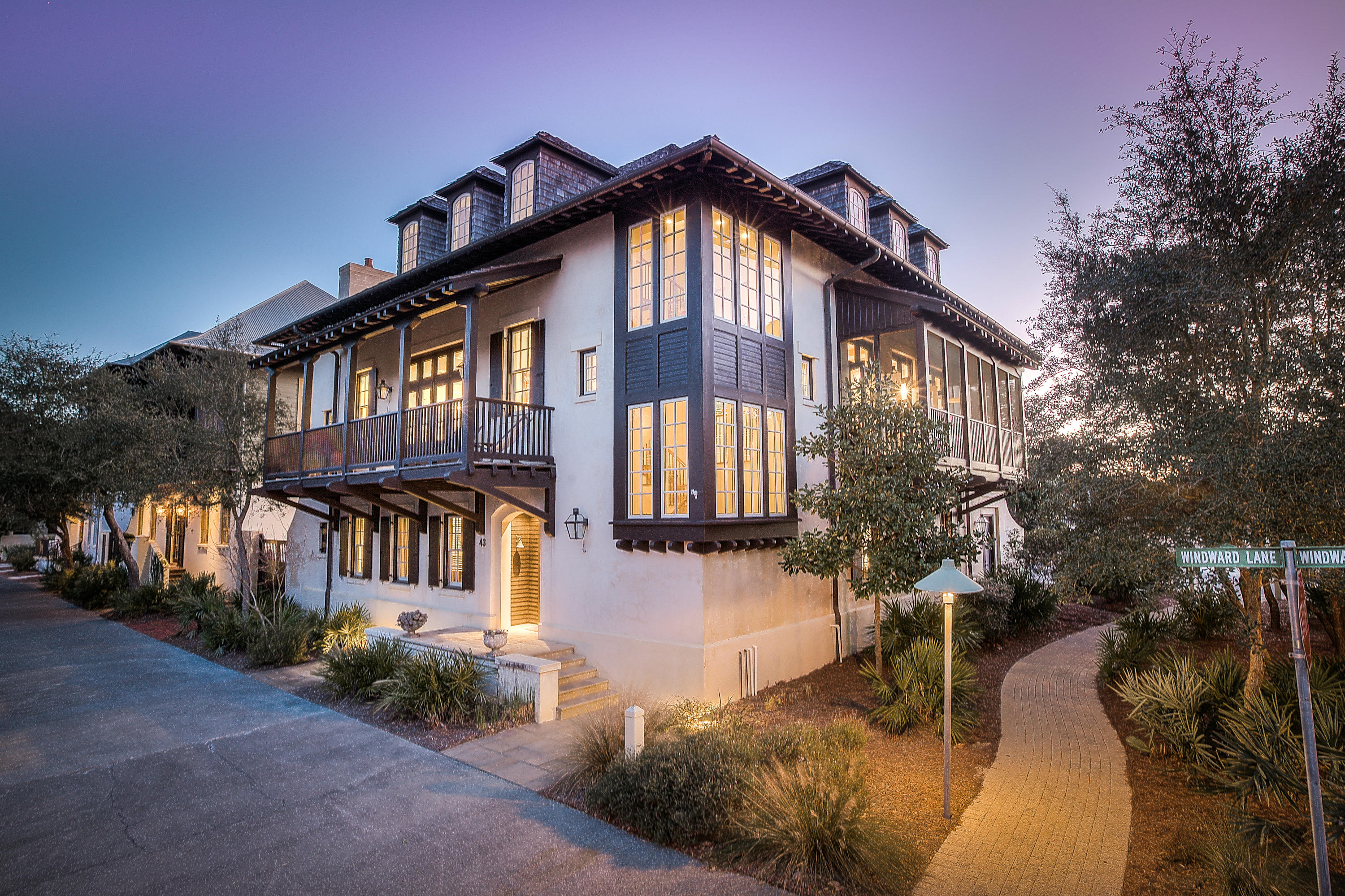 Perfectly situated on the south side of Rosemary Beach and only two off the Gulf, this spectacular, one-of-a-kind beach house is a rare and ultimate find. As you enter the gracious courtyard, shaded by stunning crepe myrtles, you will understand the treasure chest of wonderful beach living that this home has to offer. The understated elegance is felt as soon as you enter 43 Windward. The inviting, main level gallery, draws you into this pristine residence in which three wonderfully appointed guest suites await, each with its own character and whimsy. Ascend to the second level, which boasts grand scale entertaining spaces like the warm and welcoming living room, with wood burning fireplace and walls of elegant french doors, allowing abundant natural light and gulf breezes to flow easily.