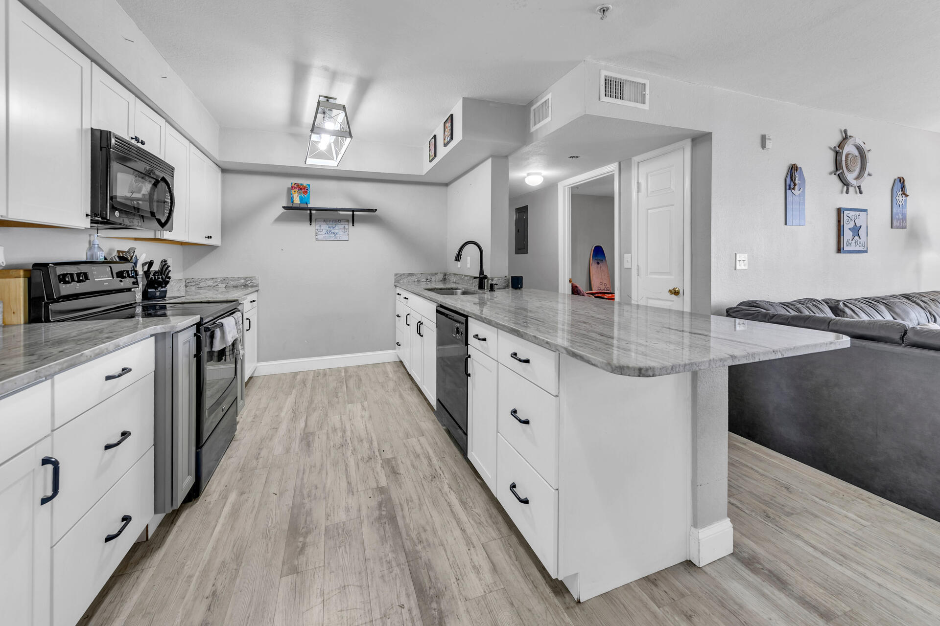 Comes with a covered Parking Space! Beautifully Renovated, this 3BR Condo is move in ready. Owned, by a prominent chef in the area, the kitchen has been expanded like no other in the complex. The granite countertops offer plenty of space to prepare and serve up a feast, while the extra cabinets are uncommon in a condo. The unit is tastefully painted and has premium LVP floors throughout. Indian Lakes is centrally located and has amazing amenities. Unit can be used a short term rental, long term rental, 2nd home or a primary residence. Schedule your exclusive showing today!