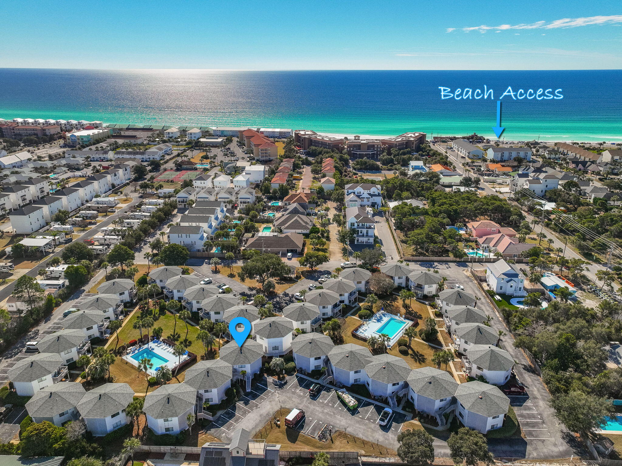 Fantastic Investment Opportunity or Beach Getaway!This beautifully renovated top-floor 2-bedroom, 2-bath condo is ideally located just 21/2 blocks from the beach. The open-concept floor plan provides a spacious feel and features beautiful views of the courtyard, pool, and lush tropical landscaping. The unit now boasts brand-new stairs and a newly rebuilt balcony.One of only eight units in the complex offering a private shared breezeway. The primary suite includes its own private bath and a large closet. Each unit comes with two designated parking spaces. Enjoy coastal living at its best -- just a short walk from beach access, dining, and entertainment.