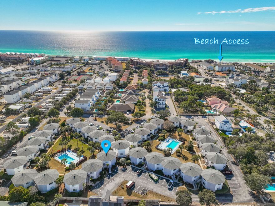 Fantastic Investment Opportunity or Beach Getaway!This beautifully renovated  top-floor 2-bedroom, 2-bath condo is ideally located just 21/2 blocks from the beach. The open-concept floor plan provides a spacious feel and features beautiful views of the courtyard, pool, and lush tropical landscaping. The unit now boasts brand-new stairs and a newly rebuilt balcony.One of only eight units in the complex offering a private shared breezeway. The primary suite includes its own private bath and a large closet. Each unit comes with two designated parking spaces. Enjoy coastal living at its best -- just a short walk from beach access, dining, and entertainment.