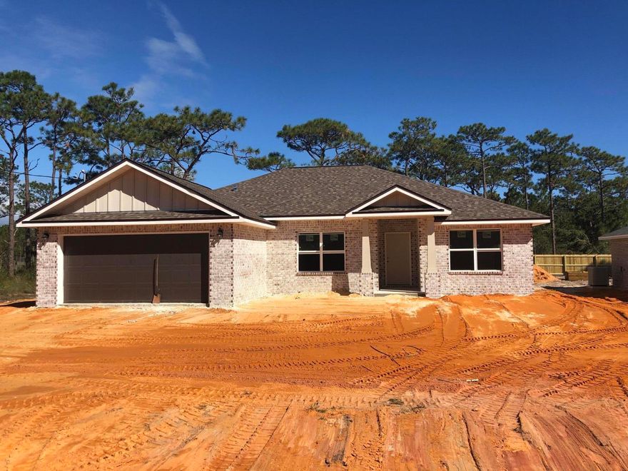 NEW ALL BRICK COTTAGE STYLE HOME w/HARDIE TRIM & COLUMNS NESTLED ON QUIET LOT ON NEW STREET IN GREAT LOCATION SURROUNDED BY NEW HOMES. PUBLIC BOAT LAUNCH JUST 2 MINUTES AWAY. KITCHEN: Level 3 Granite counters, White shaker style cabinets w/soft close drawers, Stainless appliances. Spacious pantry. MASTER BATH: Level 3 Granite counters, dual sink, large custom tiled shower w/seamless glass door, Dbl shelved w/i closet. MASTER: tray ceilings, crown, puck LED lights, ceiling fan. PLUS: PREMIUM Vinyl wood plank floors. 12x24 tile in baths. Office/Bedroom LVP flooring, 3 Additional Bedrooms carpet. Covered back porch, Ceiling fans w/light, Hurricane Fabric protection, Kitchen Backsplash, Pull down attic, Architectural Shingles, 5-1/4'' Baseboards, Crown in 10 ft. areas....SEE MORE...