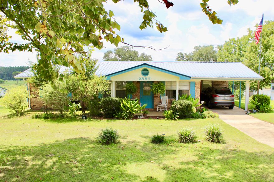 Country Living but not far from town. Only 34 miles to mid bay Bridge. This home is surrounded by pastures. Sit in your A/C sunroom or out on the patio and relax with the beautiful view of the grassy hills and a large pond. The outside patio has a small built in refridgerator to keep your drinks cold. There is plenty of outside storage. Storage buildings have electricity and water. There are numerous fruit bearing plants and trees (pecan, grapes, plus). As you enter the home you will find two nice size rooms one on each side (den, office or space to add a 3rd bedroom). You also have a very large family room which currently has a nice stove/heater (owner willing to sell it to the next owner).
This home has been very well kelp and is just waiting on the next owner to call it home.