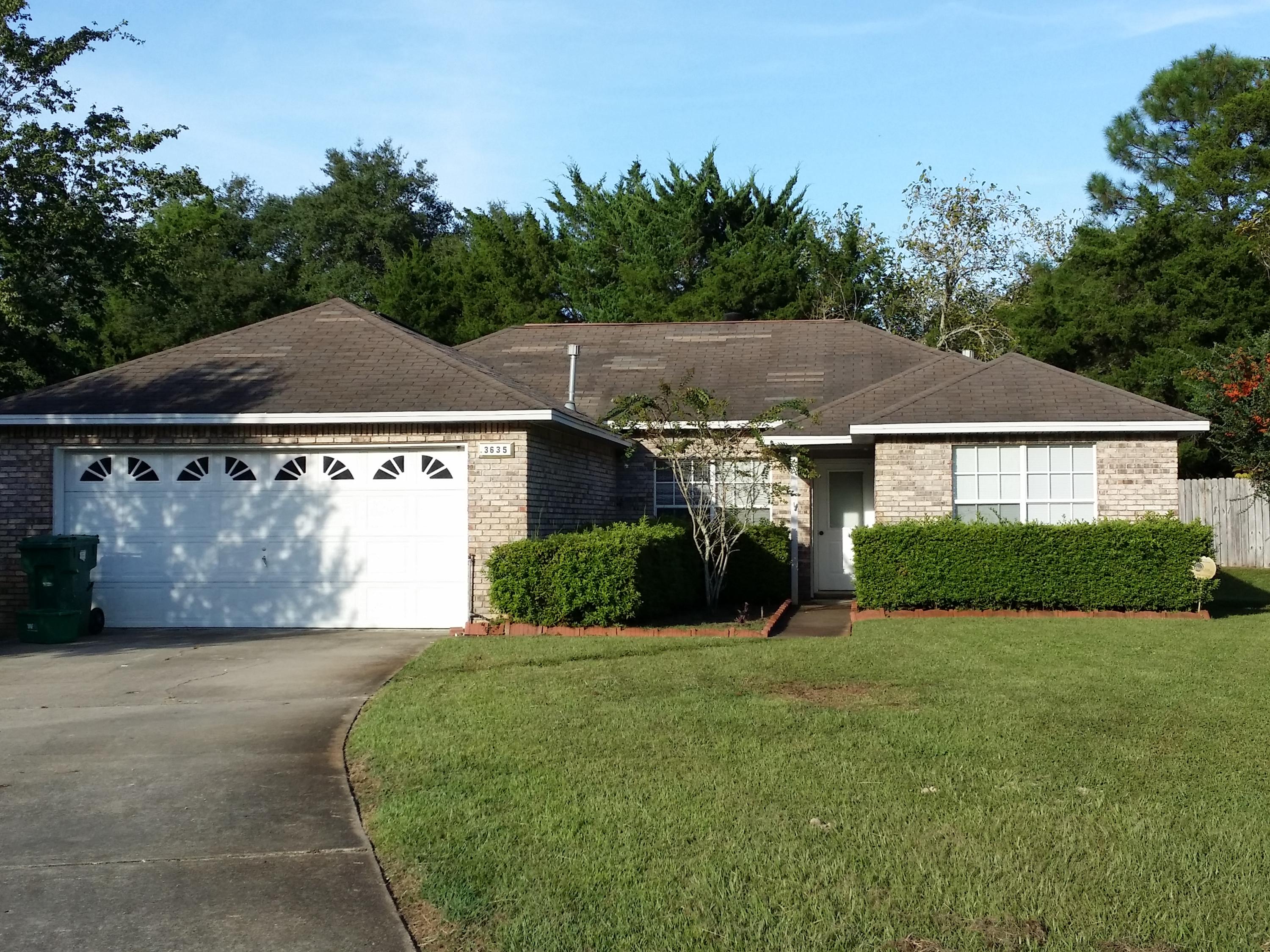 Unfurnished home centrally located in Destin; close to school as well as local shopping. Spacious living room with cozy fireplace. Kitchen equipped with appliances and gas stove. Master Bath contains beautiful double vanity and walk-in closet. Washer and dryer hookups included. Displays privacy fenced backyard, and a brand new open deck!Washer / dryer hookups.LAWN SERVICE INCLUDED. Pets allowed w/deposit. No Smoking.