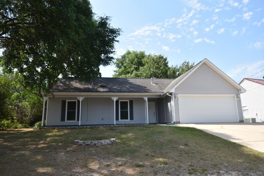 REDUCED FOR QUICK SALE! Welcome HOME ... recently renovated and ready for your family. This charming home sits on a 1/4 acre lot, offering a spacious floor plan with 3 bedrooms, 2 full baths, and a large bonus room, which could be used as a 4th bedroom. The home has vaulted ceilings and an eye-catching wood burning fireplace. New carpet and paint throughout. Interstate access is conveniently only minutes away, along with shopping and dining! Enjoy summer cookouts or let your kids play safely and securely in the privacy of your yard, surrounded by gorgeous trees and a 6' fence. Store all your toys, equipment, or yard tools in the enormous 20' x 16' workshop/garage complete with power, on a concrete slab. Home is move in ready, just waiting for your family!