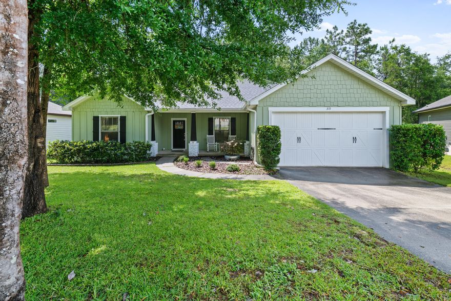 **HAS AN ASSUMABLE INTEREST RATE OF 2.75%**This gorgeous home has been meticulously cared for by its current owners who have poured love into it since they day they moved in!This 4 bd, 2 bath home sits on 1.96 acres! The backyard is a serene oasis where if you chose, you could go for a hike, camp & even go fishing or you can sit on your back deck overlooking nature!As you walk in, you'll notice the open concept with a flex room that is currently being used as an office to the right!  It's split concept takes you to the master bedroom if you walk in & to the right; the additional 3 bedrooms are on your left with a full bathroom for all to share. The master bathroom features a huge walk in closet, double vanities, a soaking tub, as well as, a stand up showe
