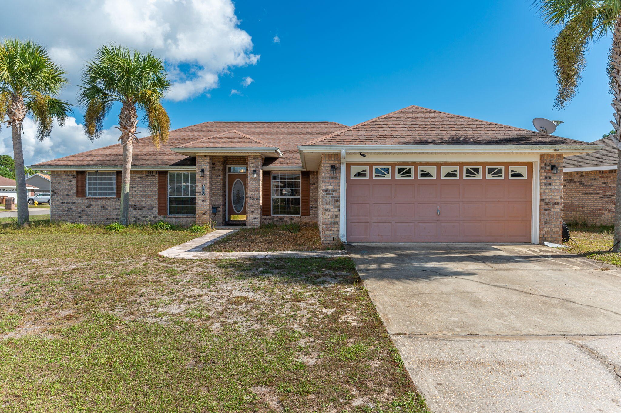 This 1,892 sqft, 3 bedroom, 2 bath home with extra office or den room is a perfect space to put your own finishing touches on. Located on a large corner lot with plenty of room to add a pool or outdoor living space. This home has so much to offer. Just minutes from Hurlburt Field and the White Sandy Beaches of both Navarre Beach and Okaloosa Island, you cannot beat this location. The roof is original to the home, built in 2004. The hot water heater is currently not in working condition. The HVAC is newer, having been installed in 2022. With some TLC this could be a great home for someone who is looking put the work and create a space they love.