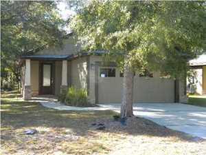 Fantastic 3 bedroom, 2 bath home in The Canopies of Freeport! This home features tile flooring with 9 and 10' ceilings, crown molding, recessed lighting, front and back porches, custom cabinets and countertops and a 2 car garage. The Canopies community has a pool and playground area and is a quiet shaded family neighborhood. Great Home!