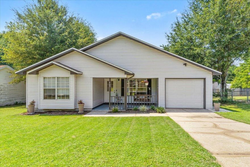 Skip the congestion and settle into the most southern neighborhood in Crestview--just minutes to Eglin AFB, Hurlburt Field, and the coast. This charming 3-bedroom, 2-bath home has been thoughtfully updated with a new roof (2023), HVAC (2024), and recently installed(2025) beautiful LVP floors flow throughout the home for a modern, low-maintenance feel. Inside, soft natural tones and tile in the kitchen and dining areas create a warm, welcoming atmosphere. Step outside to your private, fenced backyard--perfect for pets, gardening, or evening relaxation. With its unbeatable location and cozy, well-kept design, this home makes everyday living simple and stress-free.