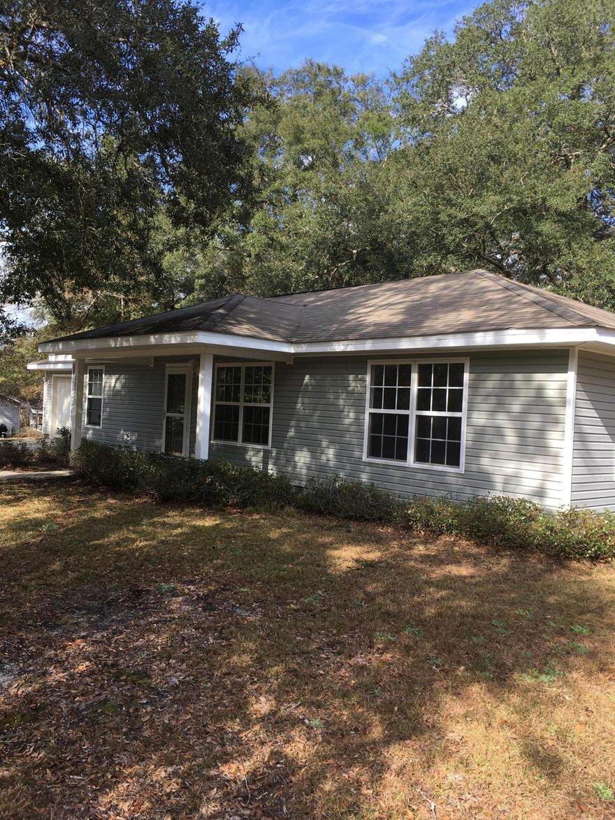 This will be the next cutest 3/2 home on the block. Home is being painted, pressure washed and spruced up for a new buyer. It will be open to show (during clean up) please call agent, don't mind the mess.. Call for showing instructions.This property is huge (almost and acre by the plat map). There is a fence in the back yard backing up to a small lake/wet area.