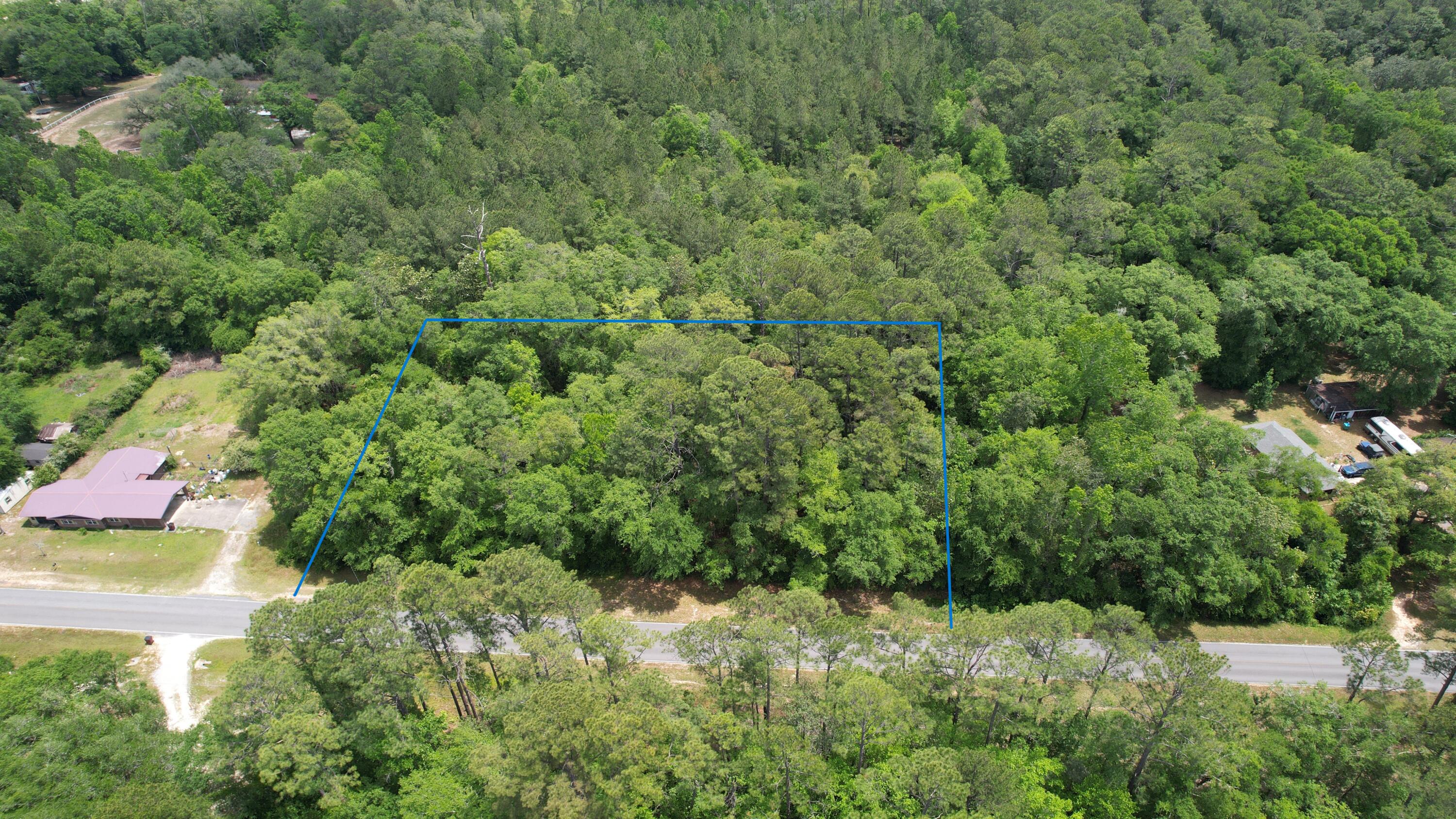 This beautiful 1.72-acre parcel offers a blank canvas for your architectural dreams. Envision your future home taking shape on this expansive stretch of land, where peace and privacy are your closest companions. Despite its tranquil location, removed from the hustle and bustle of city life, convenience doesn't take a back seat.Utilities are conveniently at the road, simplifying the transition from blueprint to build. You're perfectly positioned away from the city yet within a stone's throw of desirable shopping, restaurants, military bases, and smooth interstate access are just moments away.