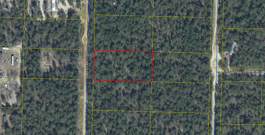 1 acres tract, wooded near Love's Truck Stop and I-10 exit. Private with Seller financing available.