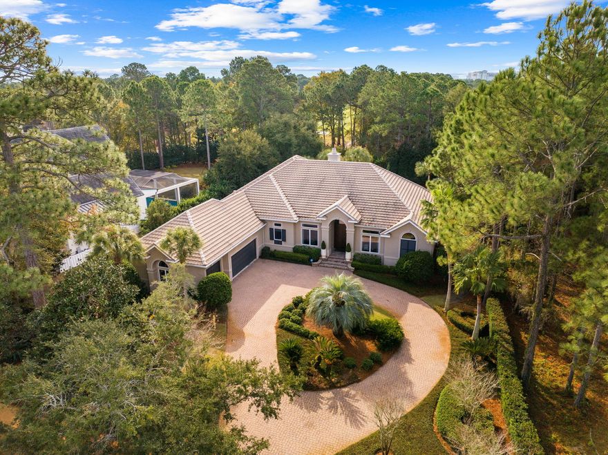 One-level living and unparalleled privacy in this updated transitional home in ultra-exclusive Burnt Pine. Fabulous furnishings are included for a move-in ready experience. Open concept living is kept cozy with dual fireplaces and mellow colors. An oversized, secluded lot sits along the golf course but generous elegant landscaping protects your retreat and your full-sized elevated private pool.  A three car garage and circular drive make entertaining and golf-carting easy. Sandestin's world of on-property dining and entertainment is within minutes but you'll find yourself worlds away. Call for your private showing today.
