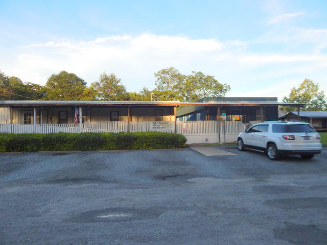 HUGE PRICE REDUCTION !!Seller wants it SOLD ~ This property is perfectly located in the heart of Baker. It is currently a very successful Day Care/Pre school and was built for and used as Medical offices prior to this.This offering is for the land, 2 buildings and all appurtenant items. The business, products and fixtures can also be bought separately if so desired. The buildings and land are in great shape. The roofs are only 4 years old. This property is centrally located across the street from the Grocery store and other thriving businesses. Hurry and take a closer look at this opportunity before it is sold!