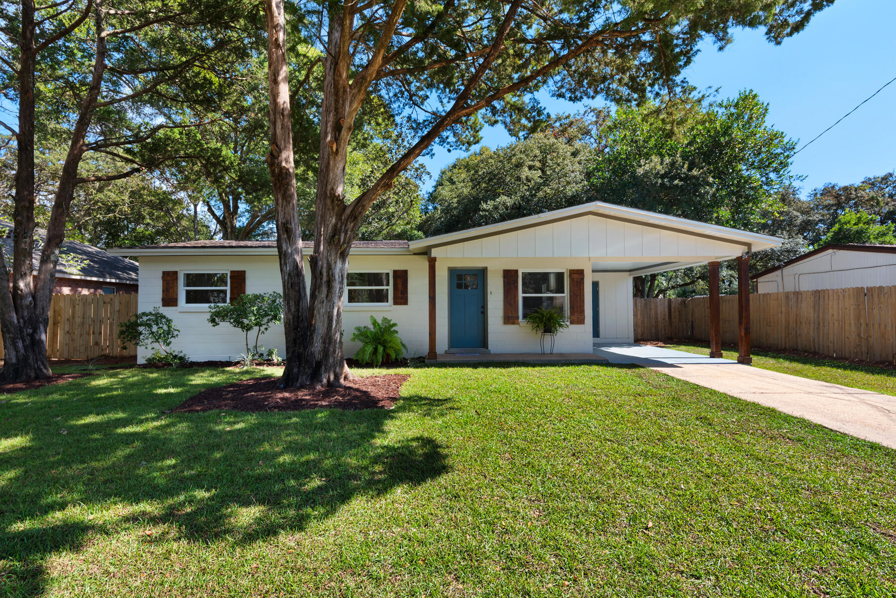 Wow! This beautifully renovated home home will surely impress you. This isn't your lipstick on a pig type of renovation. This charming 4 bedroom 2 full bath home could be the home you've been waiting for. Where to begin? The front yard and a good portion of the large back yard has been newly sodded with lush centipede grass. Wonderful cedar and magnolia trees shade the back yard which is large enough for swimming pool and much more. The stained porch posts and shutters add charm to this freshly painted exterior. This home has newer windows from a previous owner, and then we took the old and dated interior and brought it into todays standards with a brand new HVAC that includes an Ultra violet light system to zap bad microorganisms like bacteria, viruses, mold and fungi, sterilize the air,  reduce odors, and extend the life of the HVAC. Pretty cool, huh? All the wiring has been changed out to today's standards with a new breaker panel. We got away from the overdone gray renovations everyone was doing and have gone with beautiful warm colors on the walls and trim and luxury vinyl plank flooring. Shaker style trim around the doors and windows create a homey feel. The 5.25" baseboards adds some pizazz.  The kitchen is quaint, yes that means small, but well appointed with quartz counters and an enormous walk-in pantry with cabinetry with an extra 10 feet of butcher block counter space and a space to sit to Google recipes on your laptop. So, you really have a lot of counter and work space when you think about it. The two tone shaker style all wood cabinets with soft close doors and drawers adorned with brass hardware add such a level of beauty and charm. All new stainless appliances, and remotely changeable above cabinet mood lighting. LED wafer lighting through out the living spaces and ceiling fans with added light fixtures brings as much light as you need. The cute as can be hall bath is newly tiled with accent blue tiles and niche. The brass hardware goes beautifully with the blue vanity and tile accent. A warm neutral luxury vinyl plank floors through out most of the home, with tiled bathrooms and carpeted bedrooms to keep those feet warm and comfy. Plantation style shutter doors on the closets and Shaker style doors on the bedrooms and entry. An additional living space off the dining area and adjacent to the master bedroom could be used as a number of room uses. It also leads to the back porch and large fenced yard. The master suite is large and has an almost absurdly large master closet. This thing could be it's on bedroom within a bedroom. The large master bath is just beautiful. Adorned with black and white features. If you've ever gotten up in the middle of the night to use the bathroom and just didn't want the glaring lights to totally wake you or someone else, this bathroom has motion sensor lighting under the vanity that is set to a low glow for 10 minutes just so you can see what your doing and not be blinded by the light, or wrapped up...never mind.  The light level and time can be reprogrammed to various levels and times. How's that for cool factor? On to the back yard, a nice sized concrete patio and a large yard big enough for a pool and boat/RV parking if so inclined. Partially sodded, it wouldn't take much to fully sod it. There is a small shed that isn't in the best condition, but it functions as a shed should. It has power and light. Now, don't quote me on this, there is a wire run out of the shed and a PVC pipe with water in it next to the shed. It may very well be a well. All that would be needed is a new pump to keep this lawn looking good. We can't verify if it is indeed a well or a functioning well. Gas water heater, and gas heat, and although the stove is electric, there's a gas stub out, if you ever wanted to switch to cooking with gas. Oh! I almost forgot, the amazing park just one street over. The Don and Susan Stillwell Park is just around the corner and if huge. It features tons of kids playground equipment to climb, slide, and swing on. Bathrooms, pavilions, basketball court, a large field for football or soccer or just running around, and a paved walk/jog track around a pond. The entire area is fenced in and is a perfect place to take the kids, have get togethers, have fun or just get your fitness steps in.  If you've made it this far, congratulations, it's now time to call your favorite Realtor?? and say hey, let me sign the new required thing and lets go look at this awesome house.  Seller's are licensed Realtors and the listing agent. 