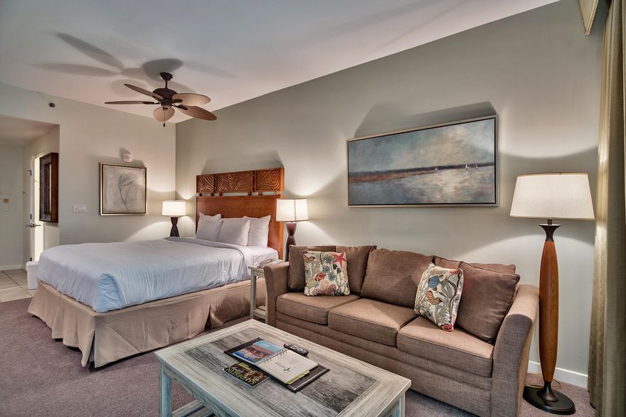 Located on the 4th floor this studio has new coastal furnishings and offers a king size bed, living area with queen sleeper sofa, and kitchenette with small refrigerator, microwave, and sink. Luau offers exceptional amenities for you and your guests to enjoy; such as a lagoon style pool with a swim-under waterfall, a fitness center, outdoor gas grills, rooftop observation deck, and easy beach access. Also included is a storage cage in the Owners storage room to keep all of your beach gear.