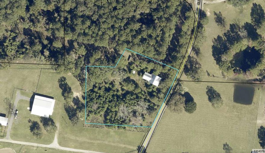 Beautiful location for country living! This 2.1 acre lot is conveniently located 3.6 miles from Yellow River WMA Reedy Landing, 12.4 miles from Baker High School, 1.7 miles from County Rd 2. There is an AS-IS structure on the property that cannot be walked unless you sign the attached ''Hold Harmless'' Form in the documents. After you send the signed document to Derek@MarkHillerSells.com, enter at your own risk. Contact Derek at (850) 902-3068 for more details.