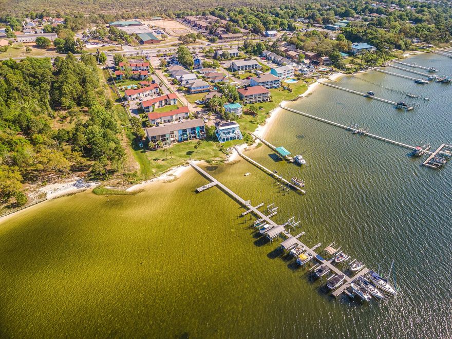 Bring your boat! Boat slip with lift will accommodate a large boat. a 12k# lift. Spacious living room/area. The kitchen has brand new granite counter tops. The bathrooms have been re-done. Fresh paint! The house is ready for a new owner.
Low HOA fees ensure easy living! Go lay by the pool instead of cutting grass! Play tennis or spend time down on the dock! This unit is literally minutes to Hulbert Field! Come home from work and go out boating in minutes! Great investment, great price! Perfect for an absentee owner. Could be a winter residence, make it your home! Come and take a look!