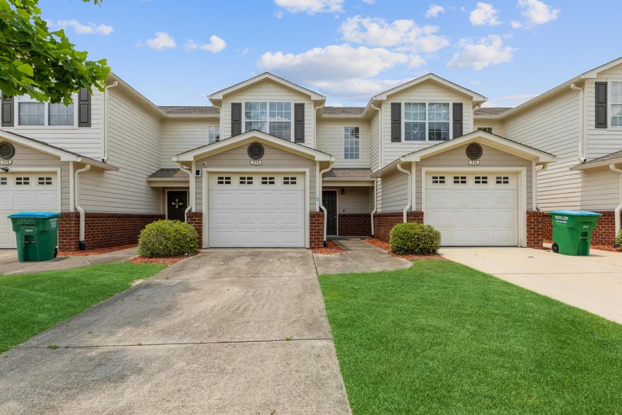 Don't miss out on this perfectly located 2 bed/ 2.5 bath townhome in Eagles Landing. Once you enter the front door to your foyer, you walk down the hall to the downstairs half bath/laundry with newer washer and dryer (conveys). Then you pass your kitchen and head into the spacious living room. As you walk up the newly carpeted stairs to head up to the 2 master suites, both with their own bathroom. Enjoy a relaxing night on your back patio, this property backs up to the preserve. When the summer heat kicks in, enjoy the community pool to cool off! Ring camera on garage and front door stay with new homeowner.