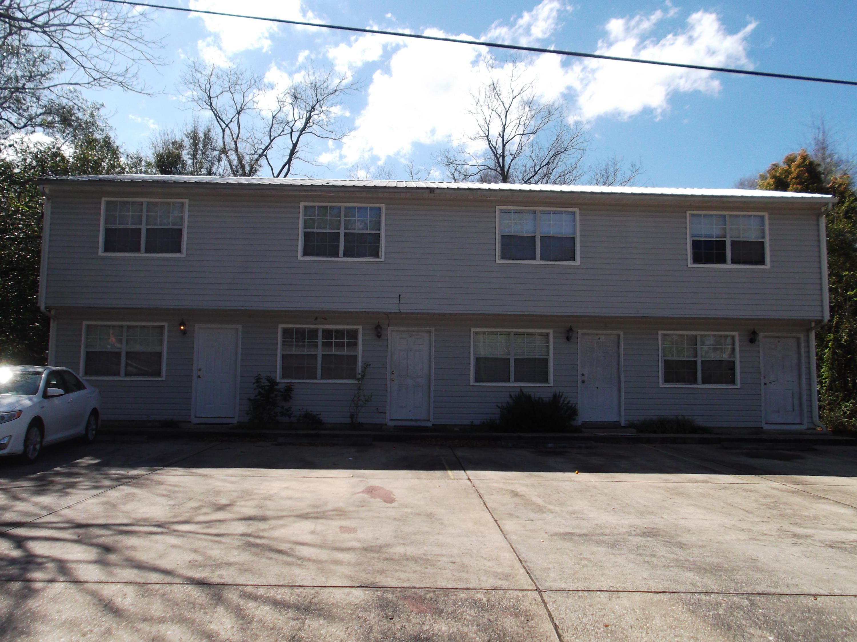 INCOME PRODUCING Property is a 4-Plex development with a 2 bedroom 1 Bath unit mix. All 4 units are leased. Included in the documents section is pricing and property information