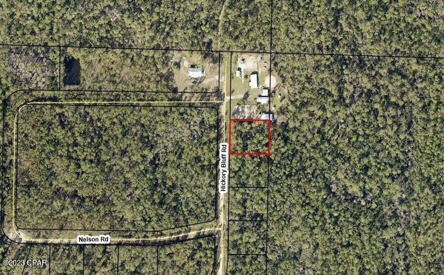 Hickory Bluff, named for the trees and high and dry land, here is a building lot, ready for a new construction or mobile home. Surrounded by new homes and a short distance to Fanning Bayou, fishing, boat ramp and just a few miles from Lynn Haven. The lot has with no association fees so bring your boat, RV, build a pole bar or workshop. Peaceful, quiet and ready to go today! Lot next door is for sale as well or choose from any of the 50 lots we have for sale in Hickory Bluff community! Call for additional details.
