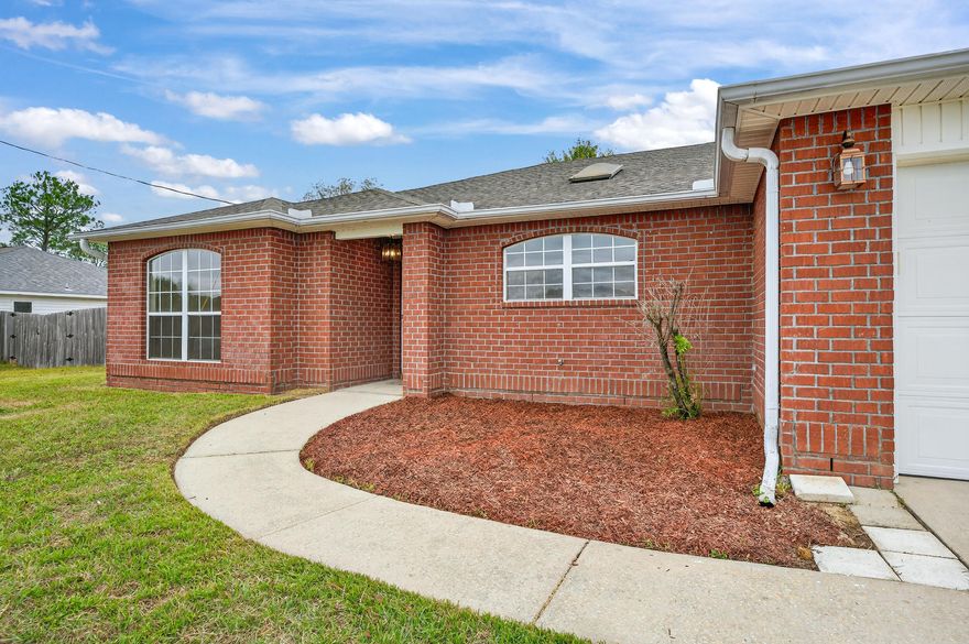 Beautiful 3BR/2BA home in prime South Crestview location--just minutes to Eglin & Hurlburt Field! Built in 2003, this 1,830 sqft home offers tile in living areas, carpet in bedrooms, fresh paint, ceiling fans, and a wood-burning fireplace. Spacious primary suite features a garden tub, double vanity, and 2 walk-in closets. Enjoy the enclosed Florida room and privacy-fenced backyard--perfect for relaxing or entertaining. Two-car garage, no HOA, and survey available. Move-in ready and conveniently located near schools, shopping, and dining!