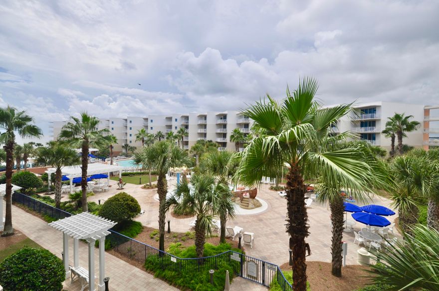 Seldom do these 1 bedroom, 2 bath units with bunks at Waterscape come on the market. This is professionally decorated and has just been painted. Updated coastal furniture, this adorable condo features 9 ft ceilings, crown molding, washer/dryer, stainless steel appliances, granite counter tops, beautiful cabinetry, and more. Enjoy a gorgeous patio that you can access from the living room and master bedroom. Great for families - each bunk in the double bunk alcove are wired with TVs and DVD players. And there is an owners closet which is not accessible from inside the unit, making it a great place for storage that the owner can access even if the unit is rented out.