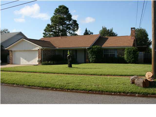 Great location in a quiet well established neighborhood. This home has a wood burning fire place in the living area with an office / hobby room adjacent to the dinning area. The back yard is a great place to entertain with large covered decks, plenty of storage and manicured yard perfect place to spend those great afternoons.