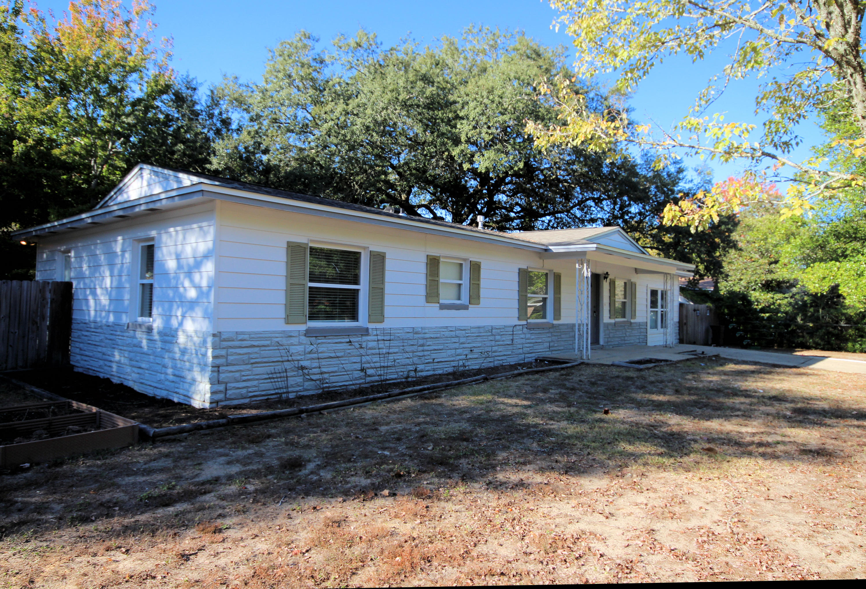 Close to HURLBURT FIELD and EGLIN AFB. NEARBY SHOPPING, BOWLING, BEACHES. MUST SEE!!! This is Slab on Grade. Beautifully Remodeled 4 Bedroom 2 Bath Detached Home Centrally located in the Heart of Fort Walton Beach. Upgrades/Updates include Gorgeous Laminate Wood Flooring, NEW Carpet in the Bedrooms, New Tile in the Kitchen, Dining Area and the Large Indoor U Laundry / Utility Room. New Plumbing and Light Fixtures. New Interior Paint throughout. Chair Rail. Ceiling Fans. Window Blinds. French Doors leading to the Fenced Backyard. Concrete Patio, Yard Shed and more on a Large Corner Lot. Easy Maintenance Exterior!Wonderful Opportunity to Own. Call Today. Buyer to verify all measurements.