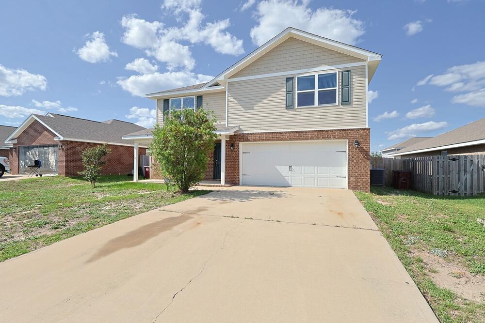 Enjoy this spacious two-story home featuring 5 bedrooms and 3 full baths, making it perfect for all buyers. The house boasts an open-concept floor plan, with a modern kitchen at its heart. The kitchen includes a large granite island, stainless steel appliances, a pantry, and a cozy dining area for meals. The first floor offers a convenient bedroom and bathroom, ideal as a guest suite. Upstairs, you'll find a large main suite, complete with a garden tub, double vanity sinks, and a spacious walk-in closet. Additionally, the loft area on the second floor can serve as a children's playroom or a second living space, providing flexibility for your needs. Enjoy outdoor moments on the charming front covered porch, which adds to the home's inviting appeal. Plenty of parking available in the two bay attached garage with automatic garage door opener. Redstone amenities include a lush community pool complete with barbeque area. Plenty of green space including a playground and fully fenced doggie park. Contact your favorite agent today to see this perfect home.
