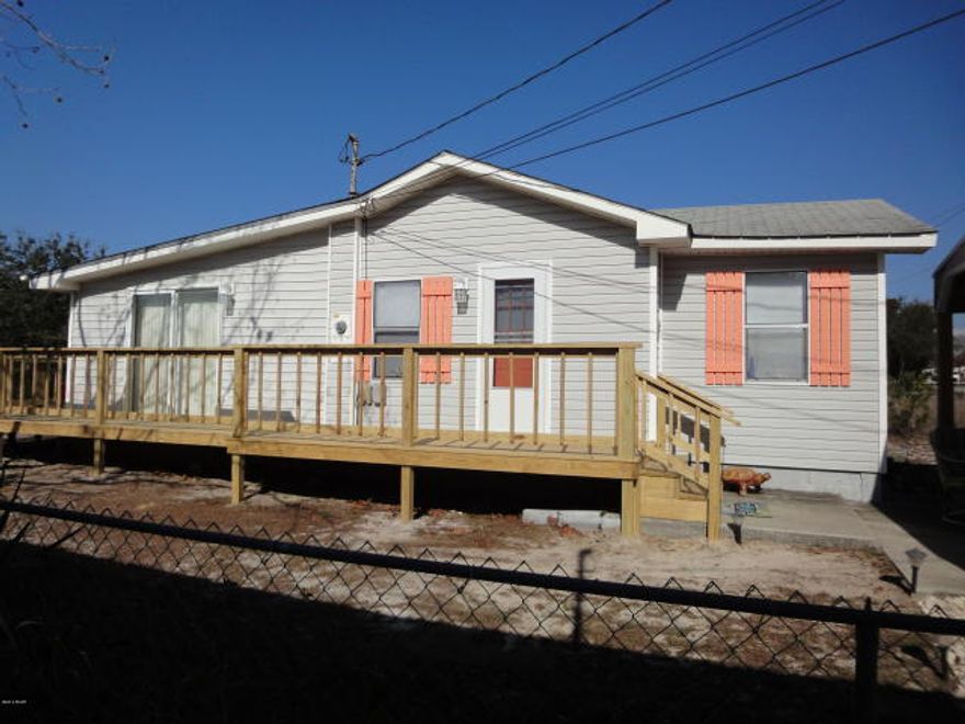 Such a sweet get-a-way on the west-end of Panama City Beaches. This vintage cottage gets sweeter with age. The large lot has a huge 20x30 garage/workshop with electric perfect for hobbies and perfect to store your golf cart and beach toys. There is also a nice carport and to top it off the lot is fenced. This is the ideal beach cottage, it is just enough and this gem is only a few blocks to Laguna Beach This home is truly a delight
