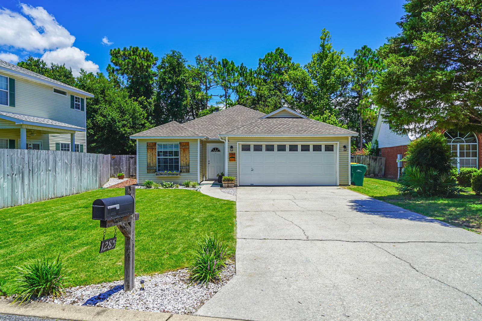 Looking for that perfect home and/or long term rental investment? Well, here it is! This home is full of charm and nestled in the subdivision of White Point Village in the desired Bluewater Bay area of Niceville! It contains 3BR/2BA and features a 2018 roof & water heater! Updated features include vinyl floors throughout with carpet in the 2 guest bedrooms, granite countertops in the kitchen, a planked wall up the wood burning fireplace, and a rock bedded firepit in the fully fenced backyard! Enjoy being just 6 miles to the beaches of Destin, 4 miles to the Naval EOD School, 22 miles to Army 7th Special Forces Group, 11 miles to Eglin Air Force Base, and 26 miles to Hurlburt Air Force Base! Don't miss your chance to OWN in a prime location!