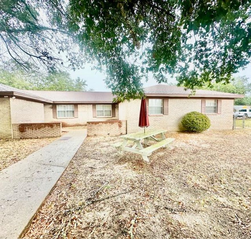 AVAILABLE: 1/28. Security deposit = $1,850 - can be broken in 2 monthly installments if qualified. 1 small pet okay w/ owner approval & a pet fee. Large unit w/ newer neutral interior paint. Kitchen has a dining area w/ all appliances in place, lots of cabinetry & washer & dryer hook ups. Tile & carpet flooring throughout. All electric! Screened patio great for relaxing/entertaining. Large corner lot with yard building! Chain link fenced yard & 2 car covered carport plus a covered front entrance. Desirable Niceville location. Welcome home!