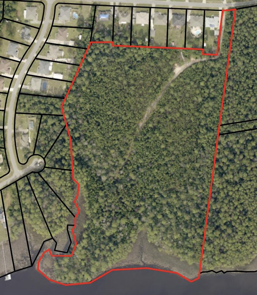 23 acres of residential land with approximately 970 feet of waterfront. Possible development opportunity or even build a custom home on the water surrounded by plenty of trees. This has plenty of room for whatever you need. Schedule your showing today