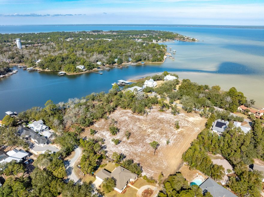 Incredibly rare assemblage of three contiguous lots on deep-water Mack Bayou in Santa Rosa Beach, Florida.This phenomenal expanse of approximately 5.73 prime acres and 443' of shoreline offers a stunning view corridor across the broad bayou to the Choctawhatchee Bay in South Walton County. The assemblage is zoned Neighborhood Infill by the F.L.U.M. and would be an ideal trophy property on which to build a generational family compound.  Please inquire for further details.