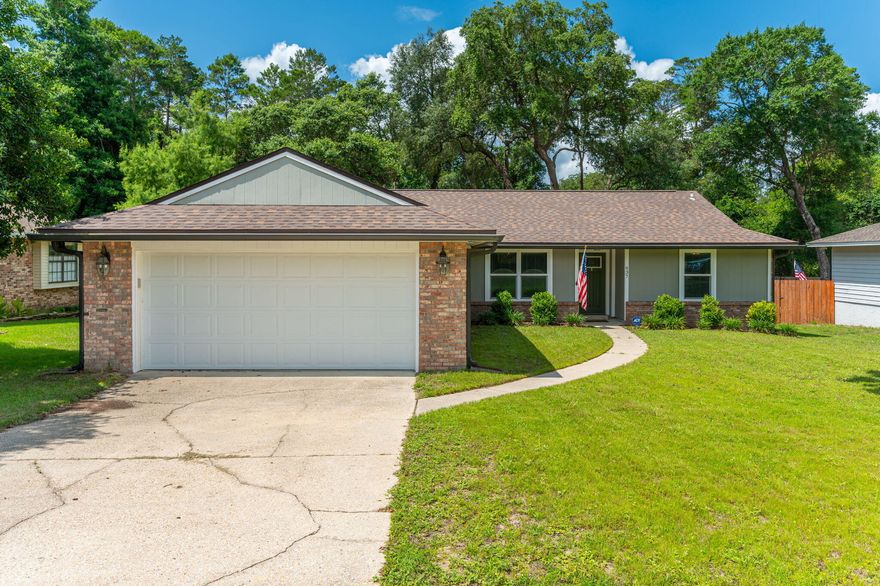 Don't miss this charming and nicely updated home in sought-after Bluewater Bay, with no HOA!Packed with modern upgrades, this home features wood and travertine flooring, new trim, solid core interior doors, new exterior doors and windows, and a new garage door. The renovated kitchen includes new countertops and appliances along with updated lighting and plumbing fixtures.  A new water heater adds peace of mind.The master bathroom has been beautifully renovated, and all bedrooms include walk-in closets.  The home lives much larger than its square footage suggests!Outside, enjoy the brand-new deck and a huge, fenced backyard with private gated access to the neighborhood green space and walking trail. Move-in ready and full of thoughtful updates, this home is a must see!