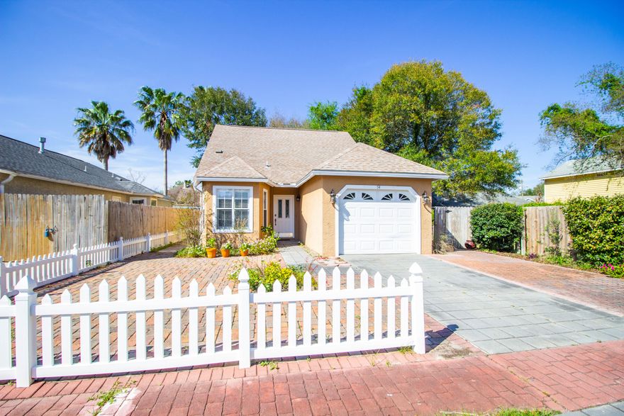 There is SO much to love about this adorable and newly renovated home in the heart of Destin, where you are able to watch the fireworks from your front yard all summer! This 2 story home offers 3 bedrooms and 2 baths, complete with a large upstairs loft that would be perfect for an office or play area. Attention to detail is easily seen as you walk through the front door and into the Foyer, then through to the Living Room, which has been updated with a shiplap ceiling, adding a ''beach vibe'' to the home. The Kitchen was completely rehabbed in 2018, to include removal of a wall and the addition of new custom white cabinetry, granite counters, Kenmore Elite stainless appliances, a 5 burner gas stove, an extra