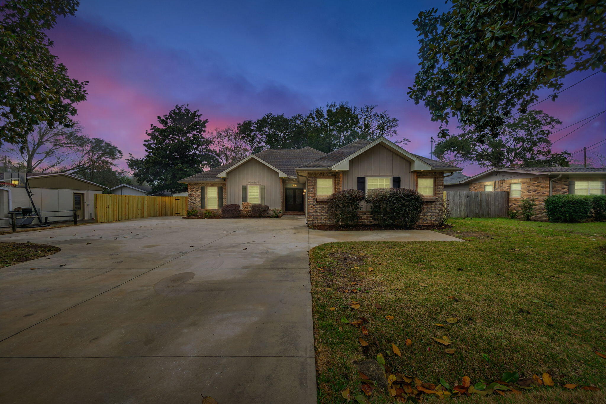 Custom-built in 2017, this 4-bed, 2.5-bath Kenwood home was designed by the builder for personal use, ensuring top-quality craftsmanship & energy efficiency. Features include 2x6' perimeter walls, spray foam insulation, & insulated partition walls. The gourmet kitchen boasts custom cabinetry, quartzite Calcutta countertops, & KitchenAid & Bosch appliances, including a gas cooktop.-Enjoy coffered and tray ceilings, a gas fireplace, & a premium trim package. The oversized garage, extended driveway, & extra parking pad provide ample space for a boat or RV. Above the garage, find expansive insulated storage.-New HVAC system features a full return duct system & variable-speed unit with a built-in dehumidifier. -Tankless water heater, fresh mulch, screened in porch & dream master closet.