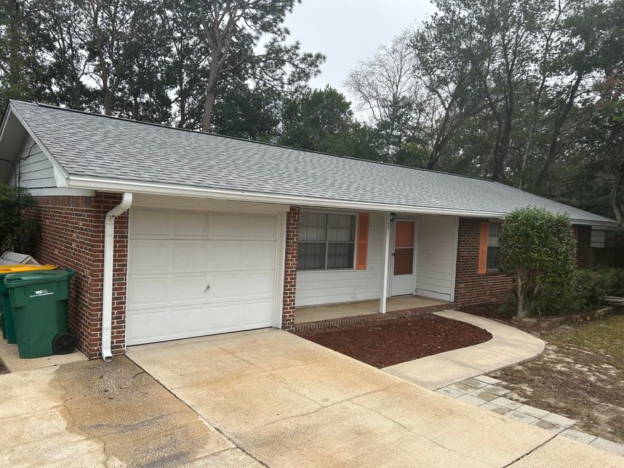 Great Starter home or wonderful investment property.  $5,000 SELLER Concession to buyer for upgrades or rate buy-down.  This single-story brick home has great curb appeal.  The driveway has been widened making it possible to park an RV or boat.  This home is move in ready with copper re-wire with a new breaker panel and a new roof and a new stove & vent hood in 2023, HVAC in 2014 & Water Heater in 2019. It can be immediately lived in or rented.  This home, complete with a single-car garage to protect your vehicle, is perfect for a first-time home buyer with the ability to update the interior over time and increase its value as you enjoy living there.  There appears to be parquet flooring under the carpet that is in the living room and hall.  Its central location is convenient to both