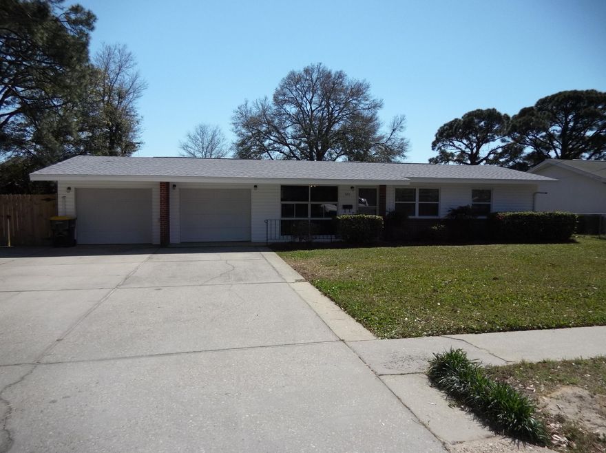 Home has been remodeled and updated. Spacious screened porch.  Spacious fenced backyard. Stainless appliances including built in microwave