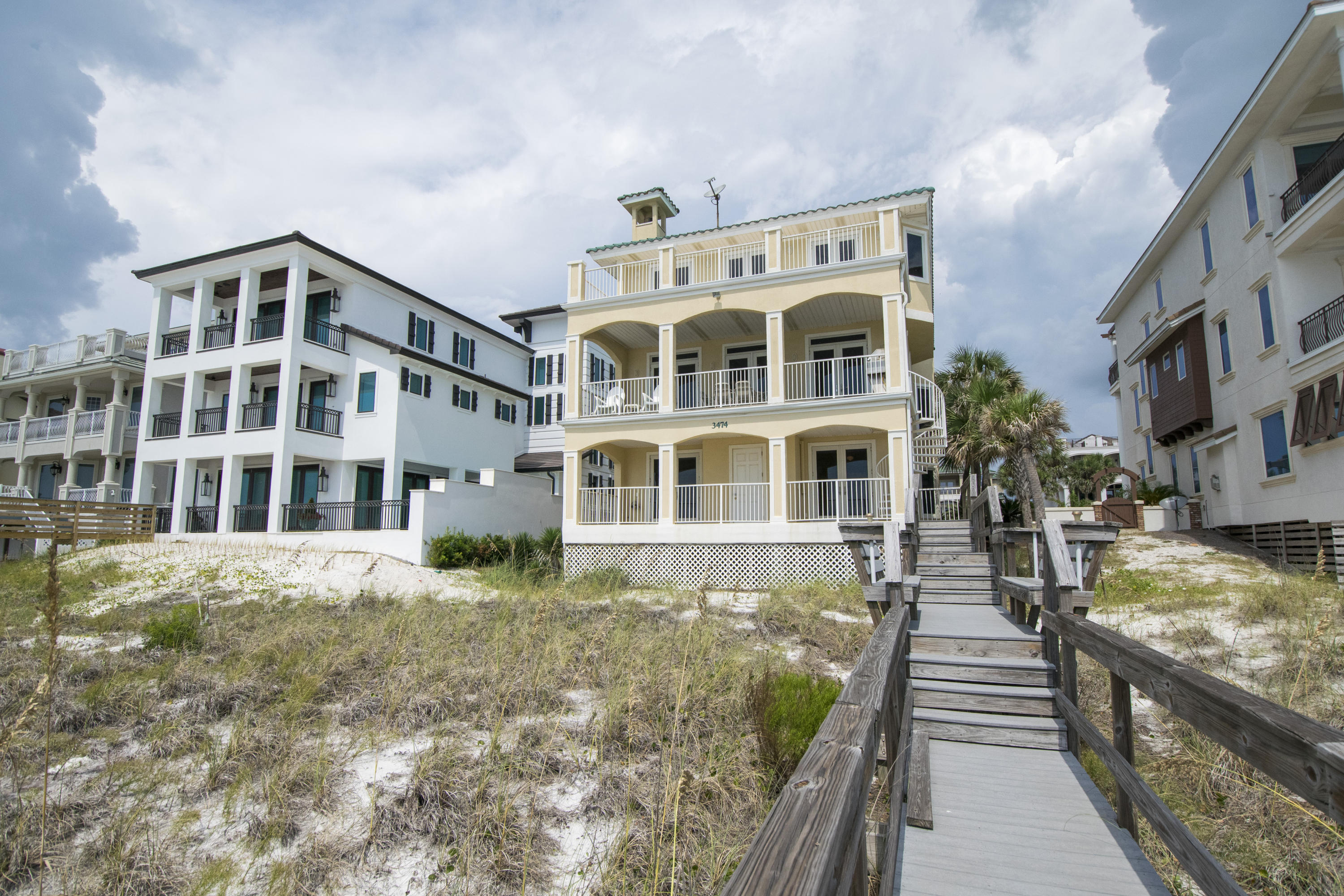 Gorgeous Gulf front home, located in the exclusive Crystal Beach community, Destiny Shores. This three story, five bedroom, six and a half bathroom home. Features an open floor plan, large foyer with elevator, large balconies with sweeping Gulf views. The custom kitchen is a gourmand's dream, with a six burner gas stove top, large island, breakfast bar, Bosch dishwasher, and Kitchen Aid appliances. Other upgrades include, Geo Therm Heating and Air, three water heaters, Rannia on third floor. Impact glass windows, crown molding throughout, Terrazzo flooring. Built -In floor safe. FEMA Flood Insurance. Voted top 10 beaches in the World. Close to shopping, Hospitals, 14 golf courses, world class fishing, and fine dining. Great beachfront home for vacation rental! Selling ''as is''