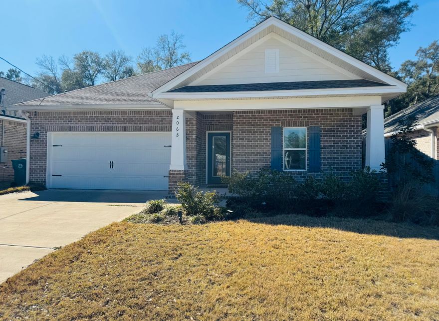 Welcome to this stunning 4/2 open concept home!  The home features luxury vinyl plank throughout.  Loads of pantry storage, wood cabinets, large island, quartz countertops, stylish backsplash, and stainless appliances make this kitchen a dream.  Well-appointed main bedroom suite with a massive walk in closet.    Relax and spend your evenings looking out to your fully fenced in back yard in the comfort of your cozy screened in porch.  A spacious laundry room and two car garage round out this beautiful like new home.  Less than 1/2 a mile away you can enjoy a scenic walk or picnic through Turkey Creek Nature Trail.  A short drive to schools, shopping, dining, the marina, and Eglin Air Force Base, make this the perfect location.  The white sandy beaches of Destin are only a 25 minute drive.