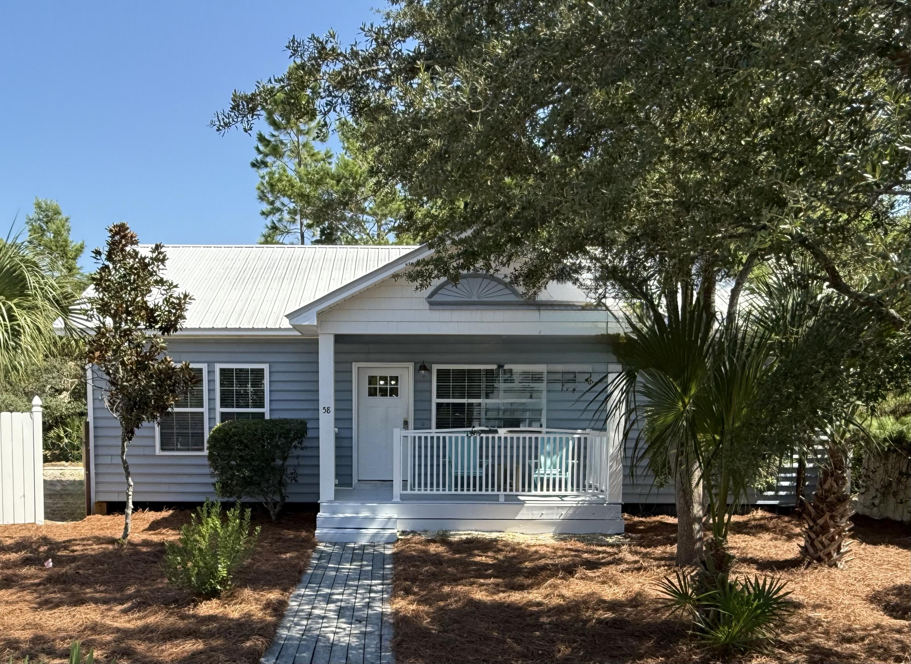 This charming, remodeled beach cottage located in the heart of Seagrove Beach in the small Gulf Cove community is only three blocks from Hwy 30A and multiple beach accesses. With vaulted ceilings and an open concept living space, fully equipped kitchen with a breakfast bar that overlooks the dining and living area makes relaxing and entertaining a delight. The owner's suite has a king bed, large closet and en suite bath. The guest bedroom has a queen bed and the third bedroom has a set of twin bunks. The cottage overlooks the private community pool that is perfect for lounging, swimming or using the communal grilling area. This three-bedroom, two-bath home is rental-ready. Walking distance to the beach, Cafe Thirty-A, Angelina's Pizzeria & Pasta and many other 30A restaurants, shops and attractions favored by residents and vacationers alike make this an ideal rental property or second home. Sold fully furnished.